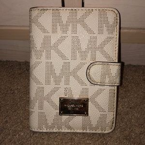 Cream Michael Kors leather wallet